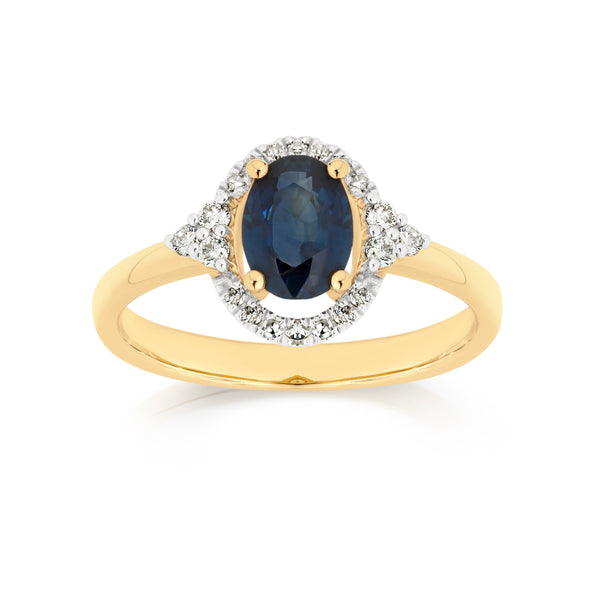 9ct 7x5mm blue sapphire halo ring with 0.15ct diamond