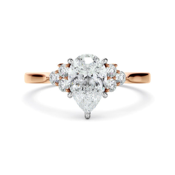 Pear Cut Diamond Engagement Ring With Diamond Cluster Sides