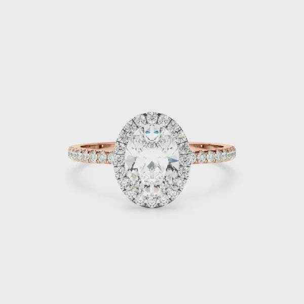 Oval Cut Diamond Halo Engagement Ring With Pave Band