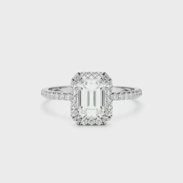 Emerald Cut Diamond Halo Engagement Ring With Pave Band